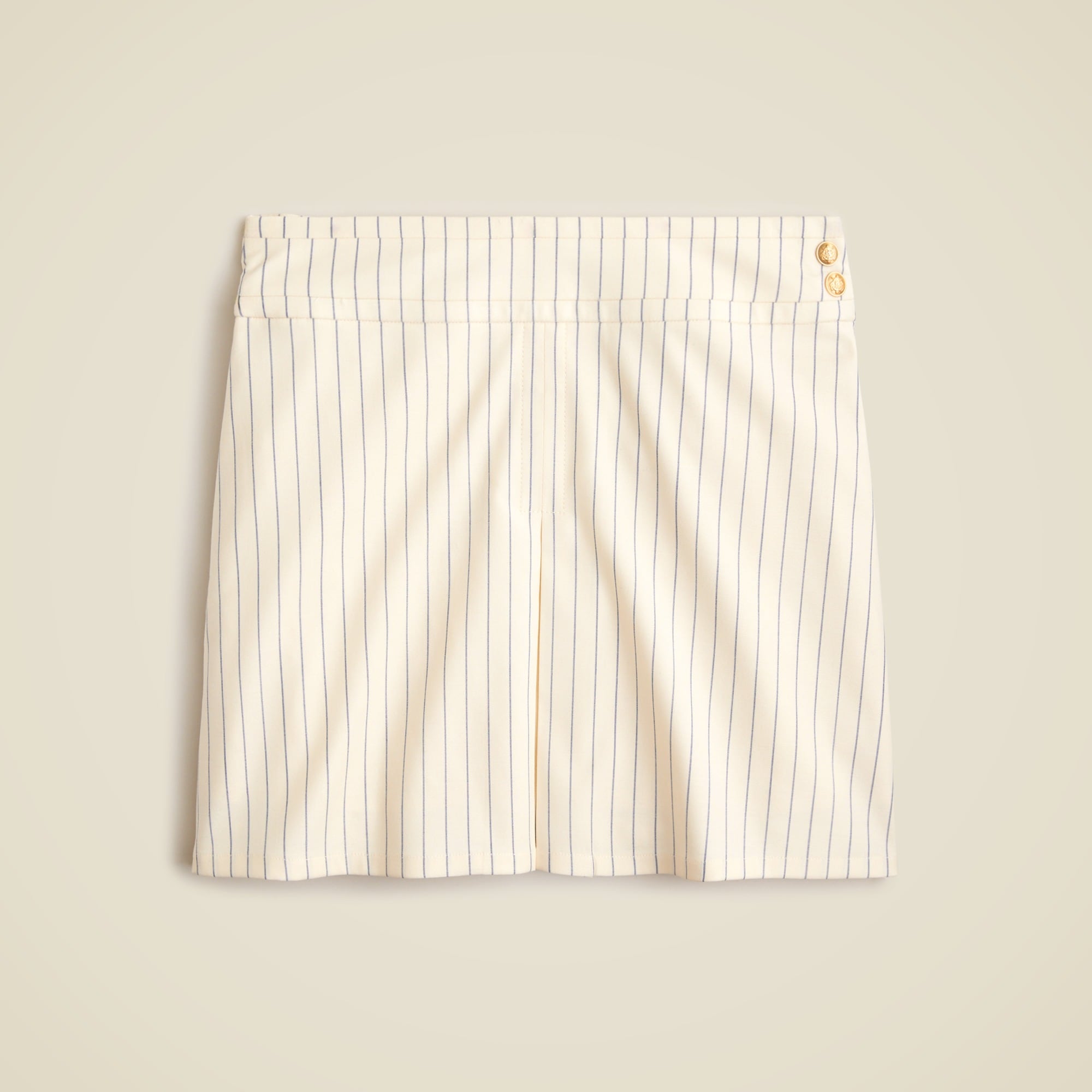  Center-pleat mini skirt in ivory pinstripe Italian wool blend